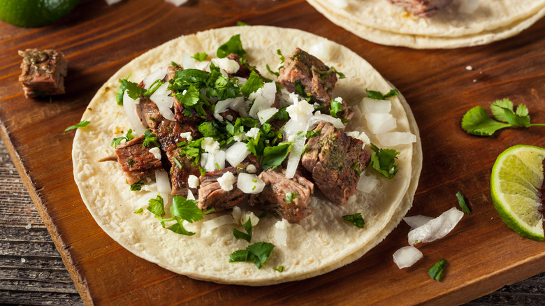 Steak taco, cilantro, and onions