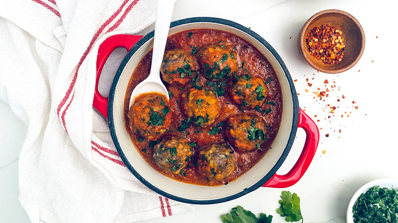 meatballs and sauce in pot