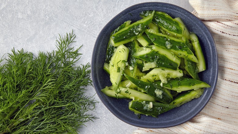 Smashed cucumbers in a bowl