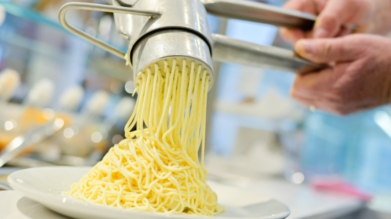 Vanilla gelato extruded into noodles 
