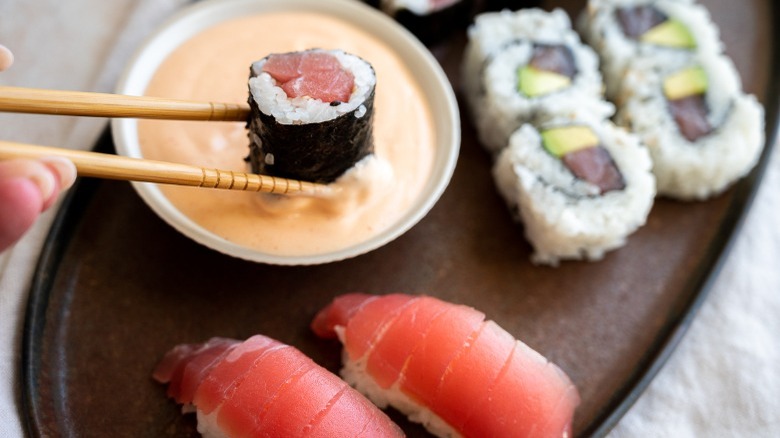 condiment in dish with sushi 