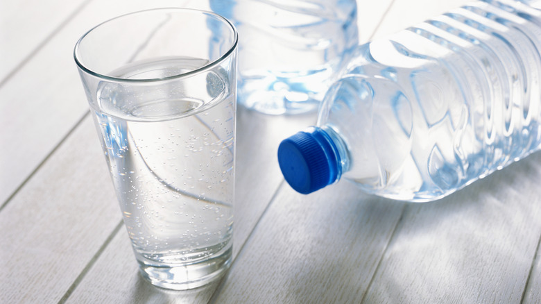 bottles and glass of water