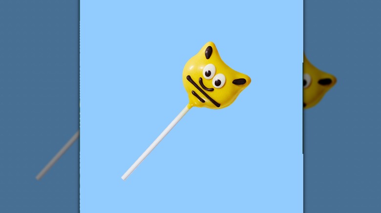 bumble bee starbucks cake pop with blue background