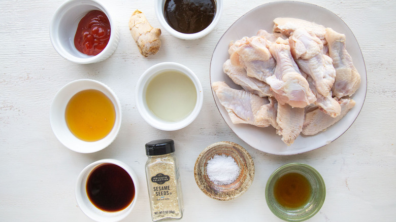 ingredients and raw chicken wings