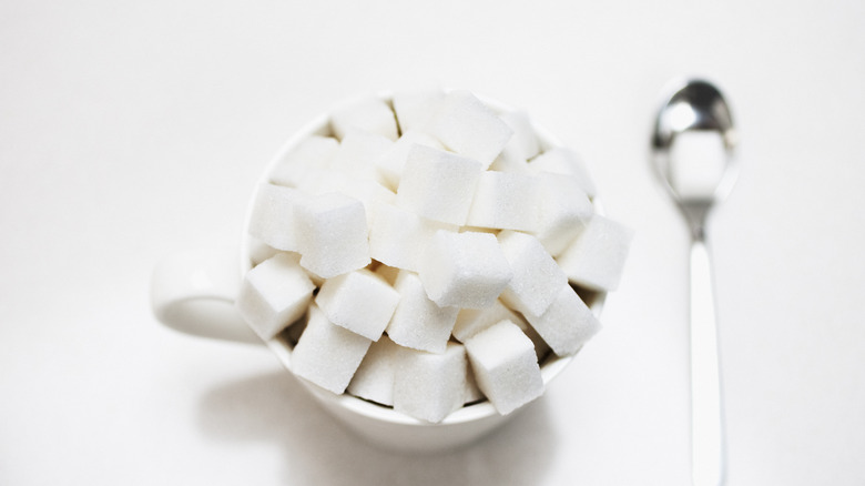 sugar cubes in a white bowl