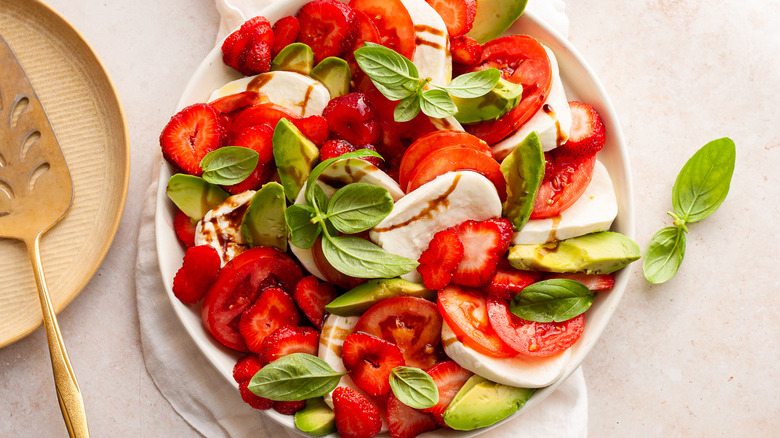 strawberry-avocado caprese salad in bowl 