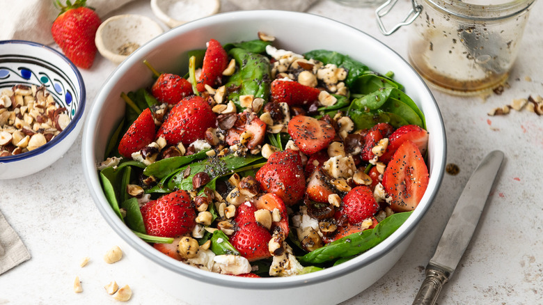 strawberry spinach salad in bowl