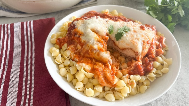 stuffed chicken parmesan over pasta