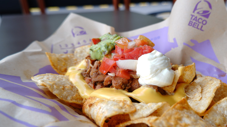Taco Bell quesadilla with guacamole and sour cream