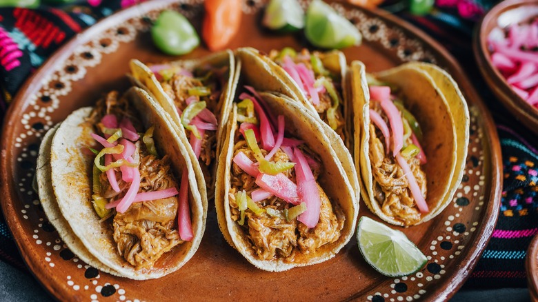Three carnitas tacos
