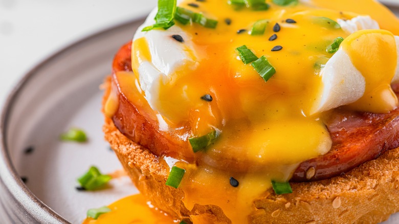 Eggs Benedict with runny egg yolk