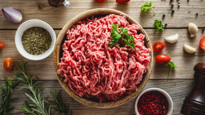 Wooden bowl full of ground beef