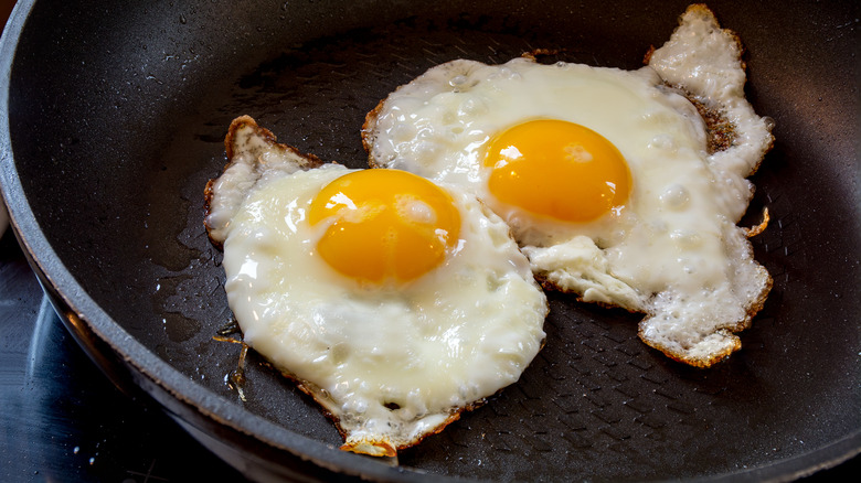Fried eggs on a pan