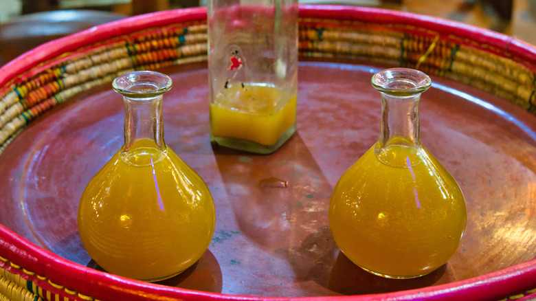 Three bottles of tej 