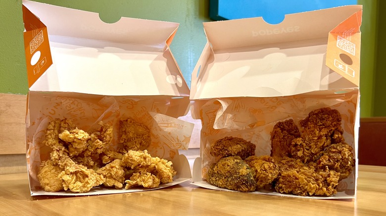 boxes of Popeyes Boneless and Bone-In Wings
