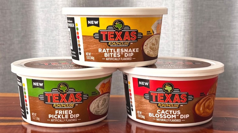 Stacked containers of Texas Roadhouse dips