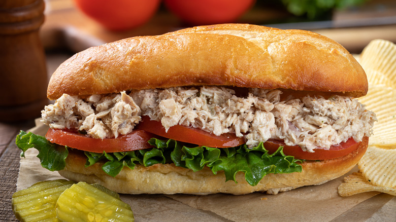 Tuna salad sub sandwich with tomatoes and lettuce