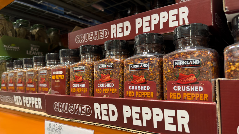 A shelf of Kirkland Signature, Crushed Red Pepper at Costco.