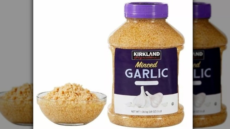 Bowl and jar of Kirkland Signature Minced California Garlic