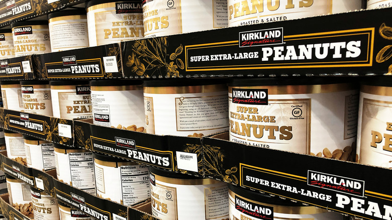A container shelf of Kirkland Signature Super Extra-Large Peanuts at Costco
