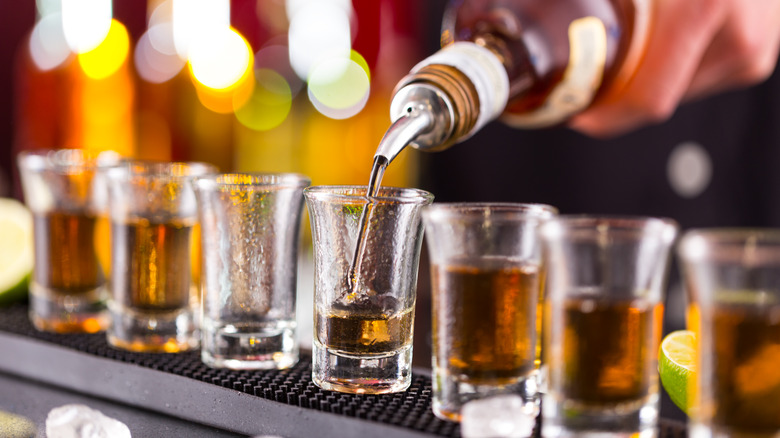 shots of alcohol being poured