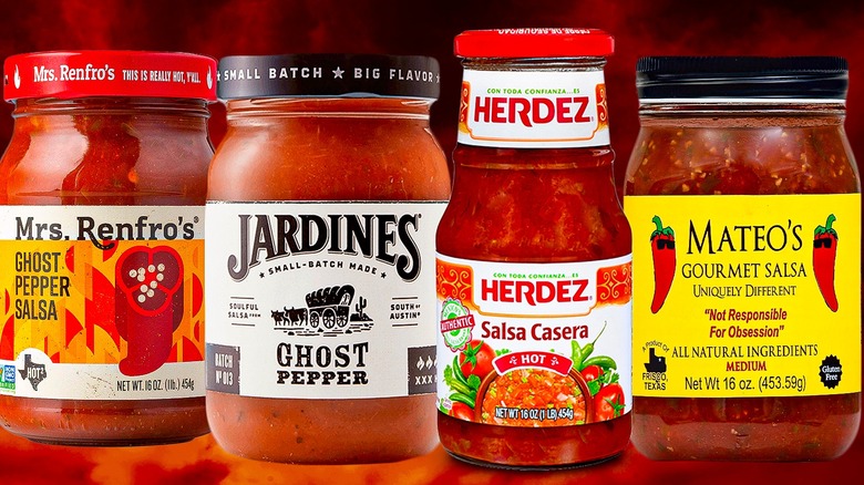 a row of salsa cans lined up next to each other