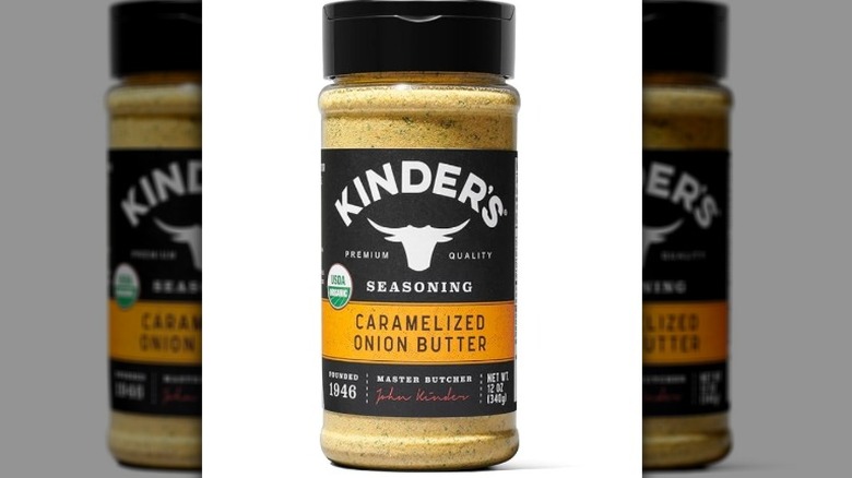 Isolated on a white background is a container of Kinder's Organic Caramelized Onion Butter Seasoning