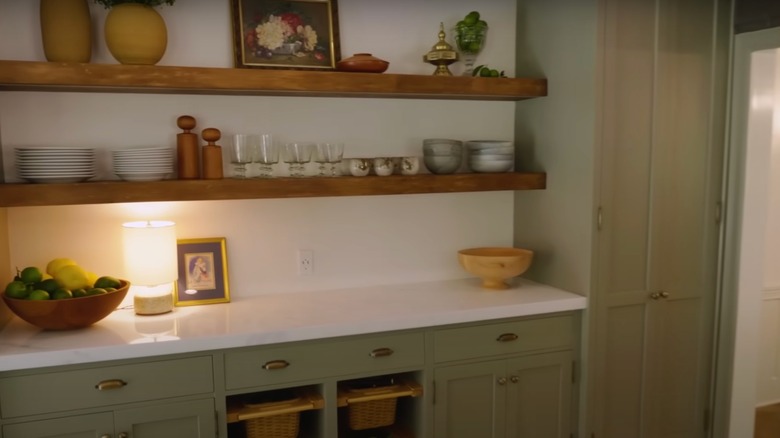 The interior of Vanessa Hudgens' kitchen, showing her open shelving