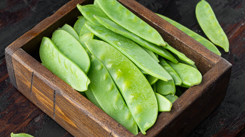 Snap peas in wood box