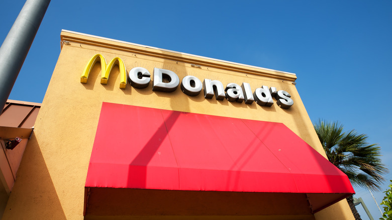 McDonald's storefront with a signage and a red awning