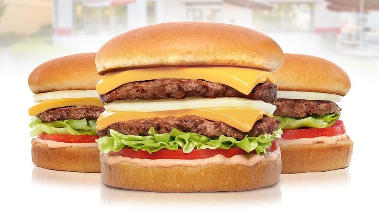 Three In-N-Out cheeseburgers