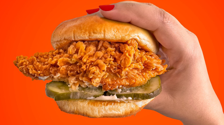 Spicy Chicken Sandwich being held