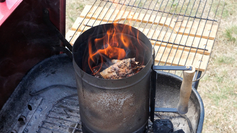 Lighting a chimney starter on the grill