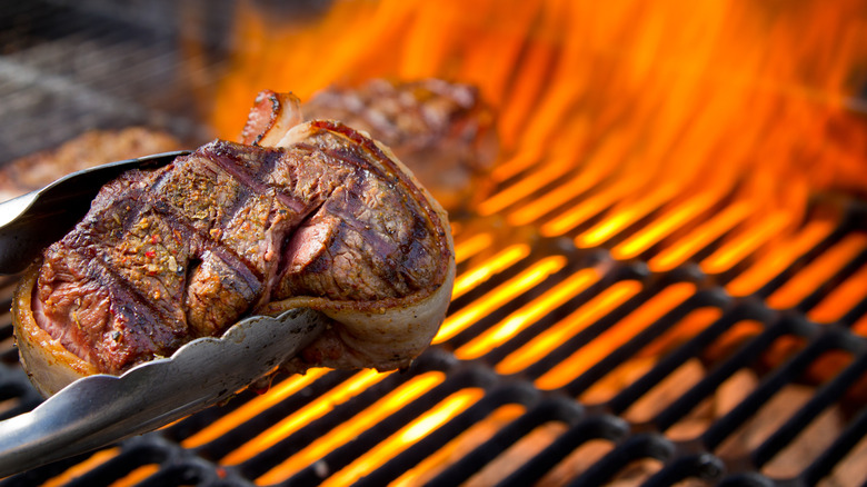 Searing a bacon-wrapped steak