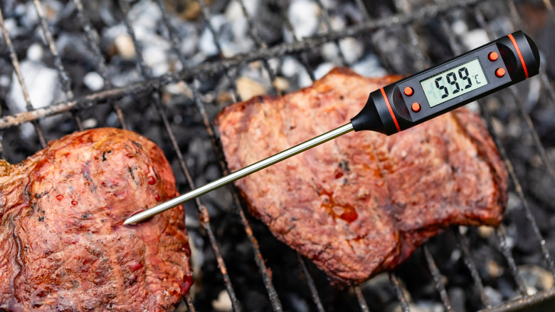 Checking the internal temperature of a steak