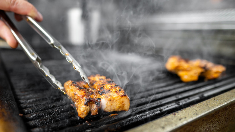 Flipping food on the grill