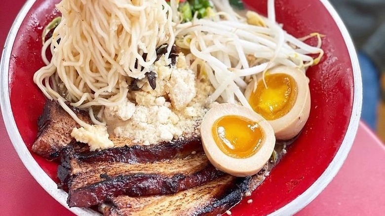 Ramen noodle bowl with pork and eggs