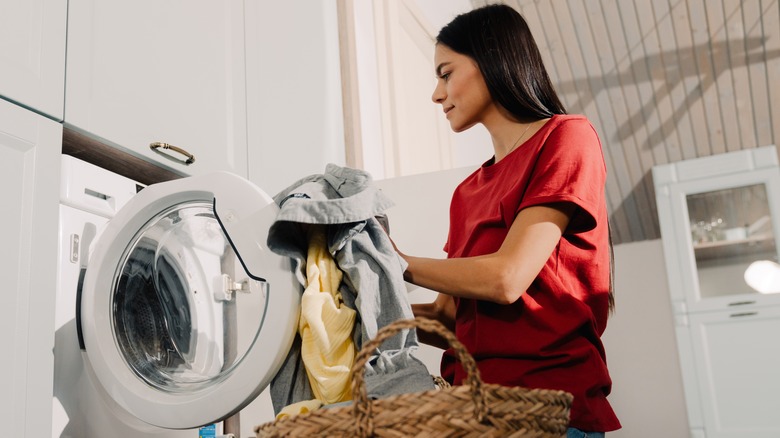 woman doing laundry at home
