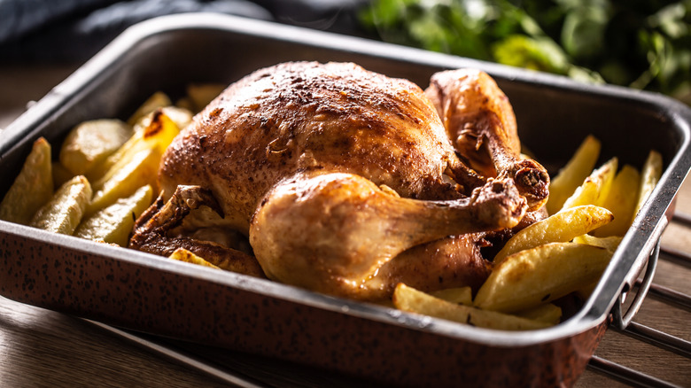 Crispy skin on chicken with potatoes