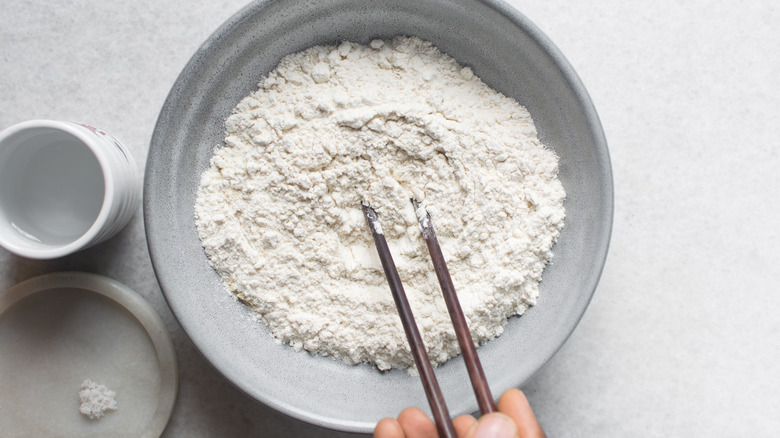 All purpose flour in a ceramic bowl.