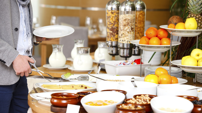 person at breakfast buffet