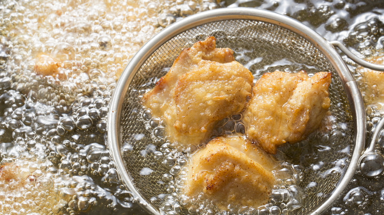 deep-frying chicken