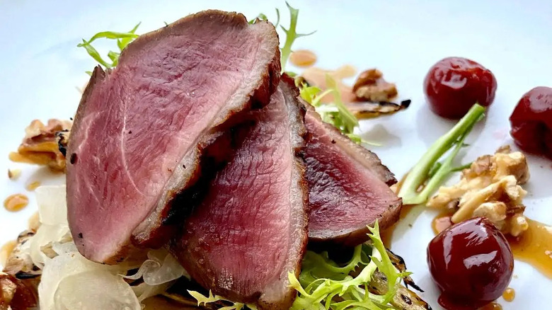 Duck served with accompaniments 