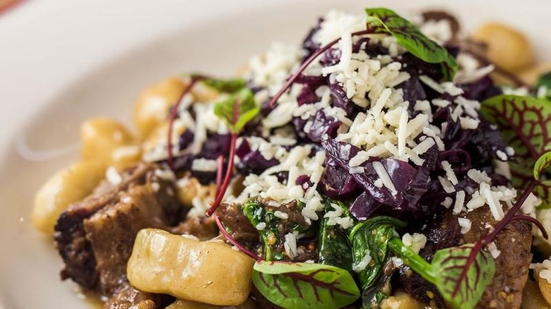 Beef rib gnocchi with garnish 