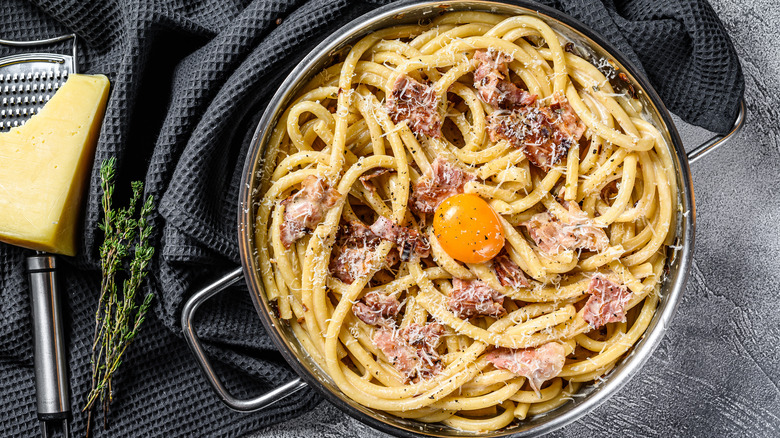 Bucatini carbonara with dish towel