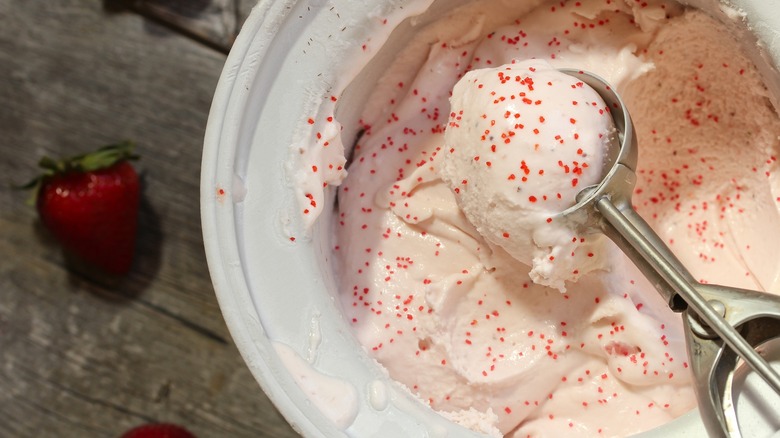 Ice cream dipper in bucket