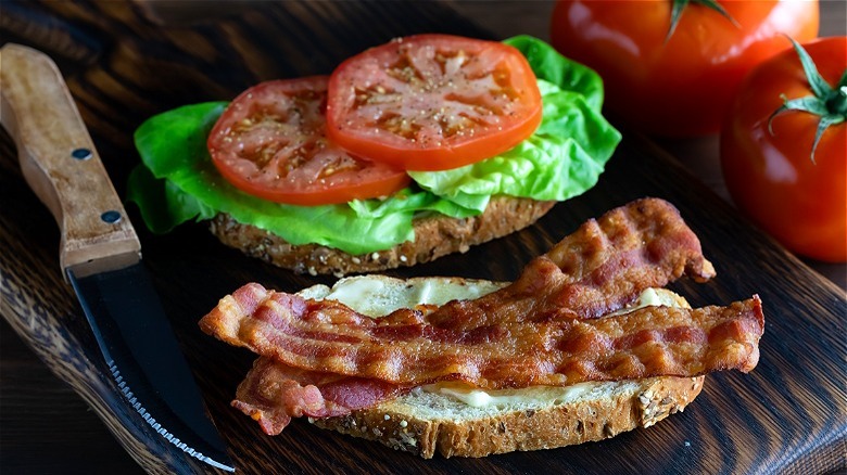 Open-faced BLT with knife