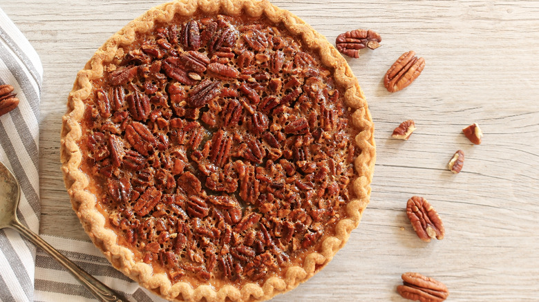 whole pecan pie on a table