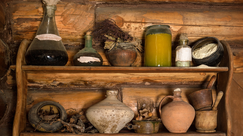 Antique jugs on shelf