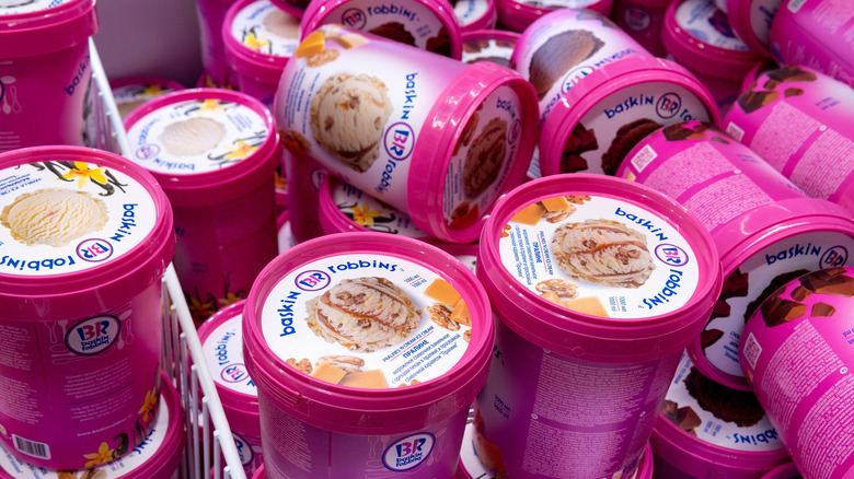 Baskin-Robbins cartons toppling over